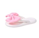 Tongs blanc a papillon rose